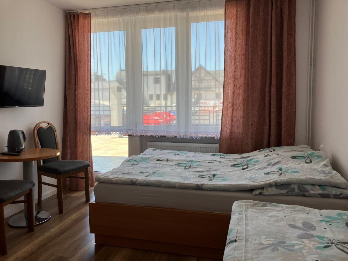 Agat Pokoje Goscinne Apartamenty Pobierowo Exterior photo
